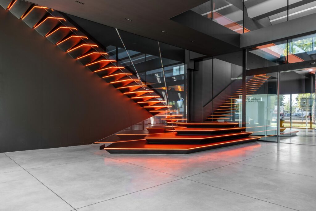 What is behind the design of this modern black staircase
