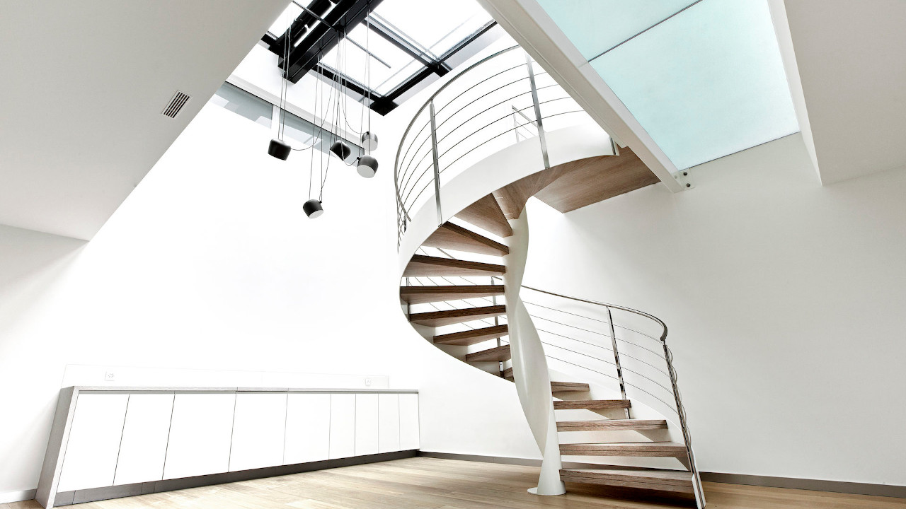 Example of indoor wooden spiral staircase with Iroko