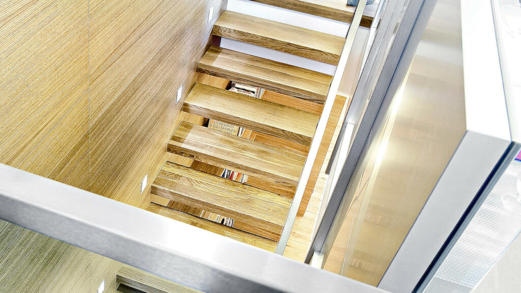 Interior oak staircase with glass and other wood species
