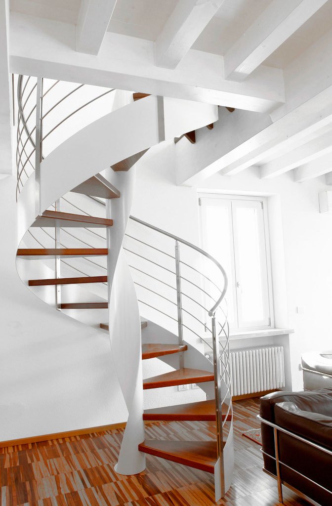 The real advantages of the spiral staircase with wood stair tread are verticality and dimensions
